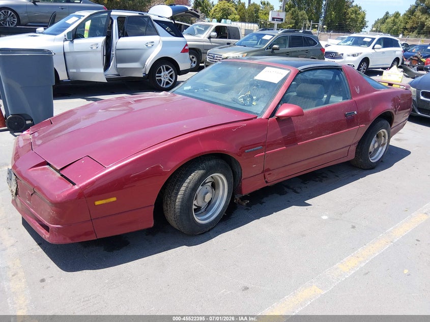 1990 Pontiac Firebird VIN 1G2FS23T1LL200060 IAAI salvage auction — NORMAL WEAR, App For Dup Clear (California), sold $550 on 2026-07-27 (photo 2)