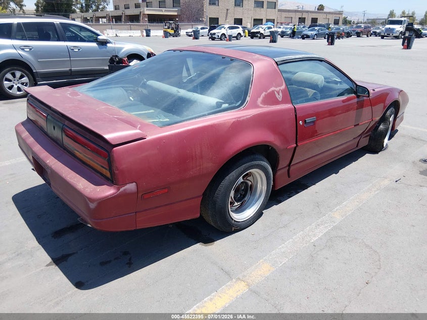 1990 Pontiac Firebird VIN 1G2FS23T1LL200060 IAAI salvage auction — NORMAL WEAR, App For Dup Clear (California), sold $550 on 2026-07-27 (photo 4)