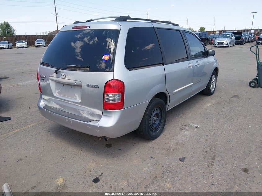 2001 Mazda Mpv VIN JM3LW28Y610178814 IAAI salvage auction — NORMAL WEAR, Clear (Colorado), sold $325 on 2026-07-28 (photo 4)
