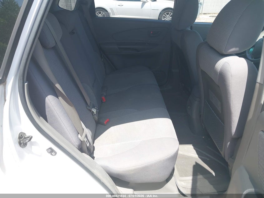 2007 Hyundai Tucson VIN KM8JM12B07U556725 IAAI salvage auction — NORMAL WEAR, Clear-Endorsement (Wisconsin), sold $650 on 2026-07-22 (photo 8)