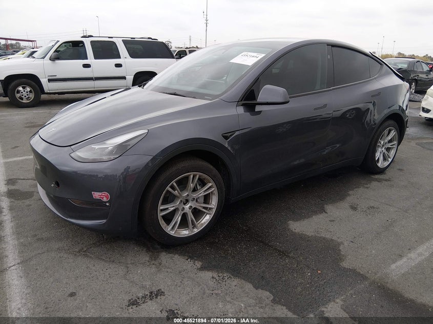 2023 Tesla Model y VIN 7SAYGDEE4PF898403 IAAI salvage auction — REAR END, Salvage Title, sold $10,300 on 2026-09-03 (photo 2)