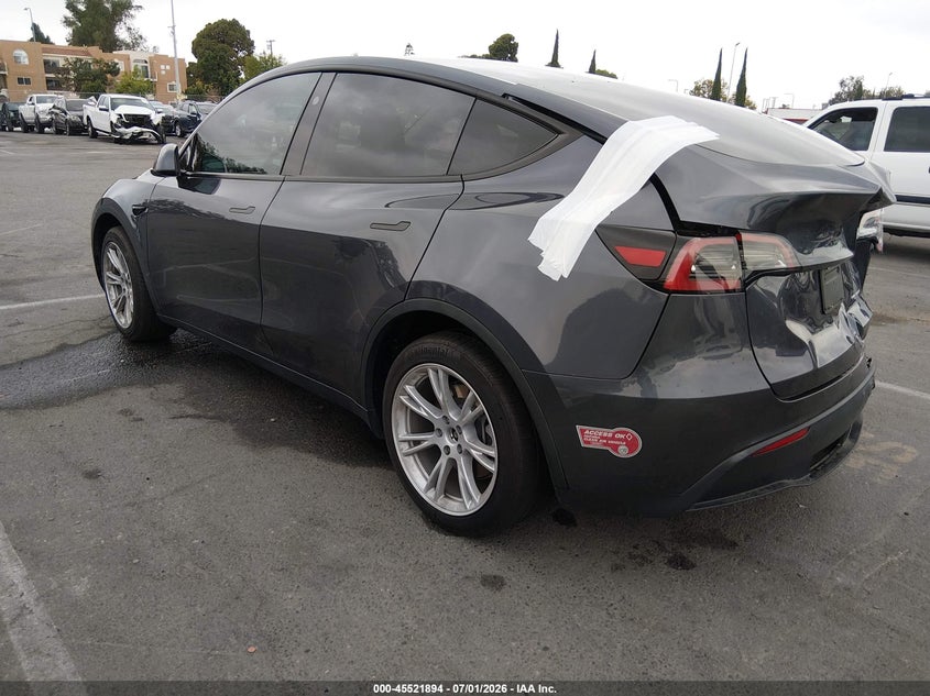 2023 Tesla Model y VIN 7SAYGDEE4PF898403 IAAI salvage auction — REAR END, Salvage Title, sold $10,300 on 2026-09-03 (photo 3)
