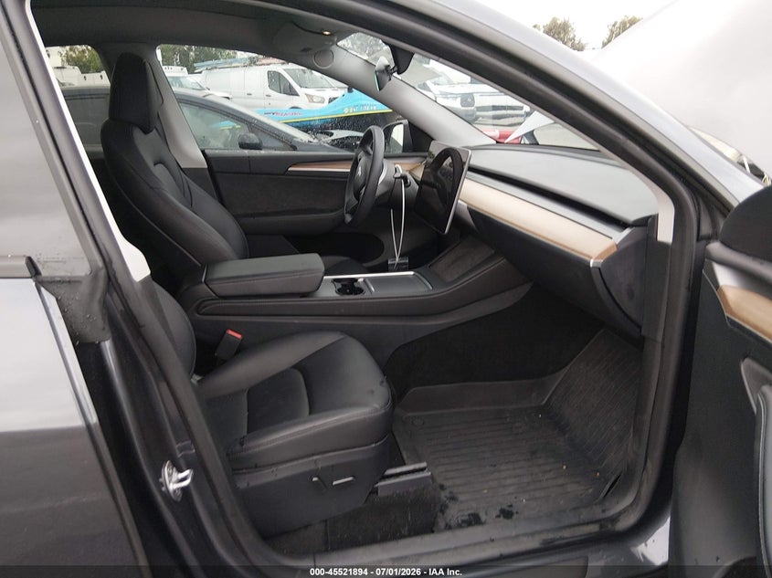 2023 Tesla Model y VIN 7SAYGDEE4PF898403 IAAI salvage auction — REAR END, Salvage Title, sold $10,300 on 2026-09-03 (photo 5)