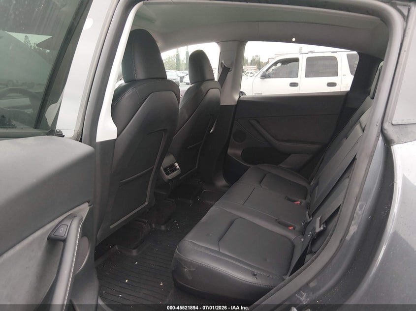 2023 Tesla Model y VIN 7SAYGDEE4PF898403 IAAI salvage auction — REAR END, Salvage Title, sold $10,300 on 2026-09-03 (photo 8)