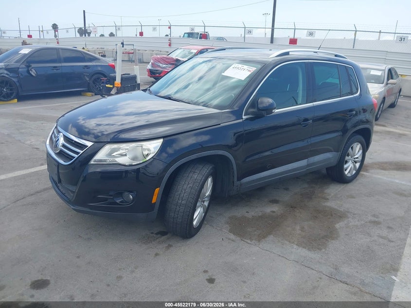 2011 Volkswagen Tiguan VIN WVGAV7AX2BW545445 IAAI salvage auction — RIGHT FRONT, Salvage (California), sold $700 on 2026-07-22 (photo 2)
