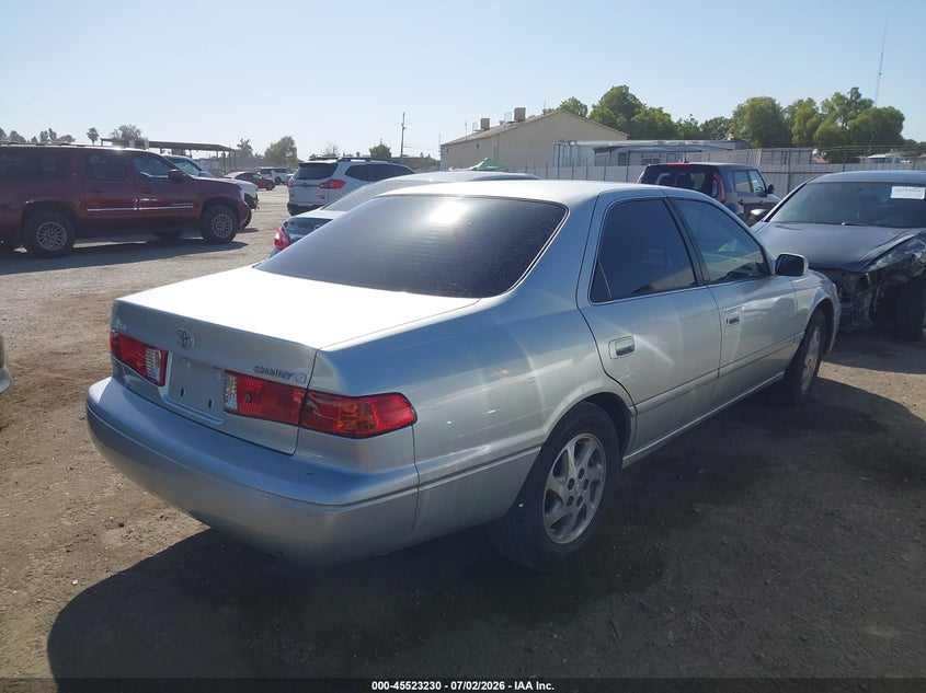 2001 Toyota Camry VIN JT2BG22K710606744 IAAI salvage auction — LEFT SIDE, Salvage (California), sold $425 on 2026-07-14 (photo 4)
