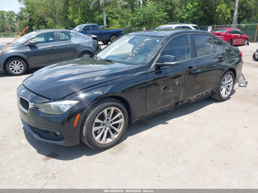 2017 BMW 3er VIN WBA8E1G5XHNU12871 IAAI salvage auction — SIDE, Salvage Title, sold $2,150 on 2026-07-29 (photo 2)