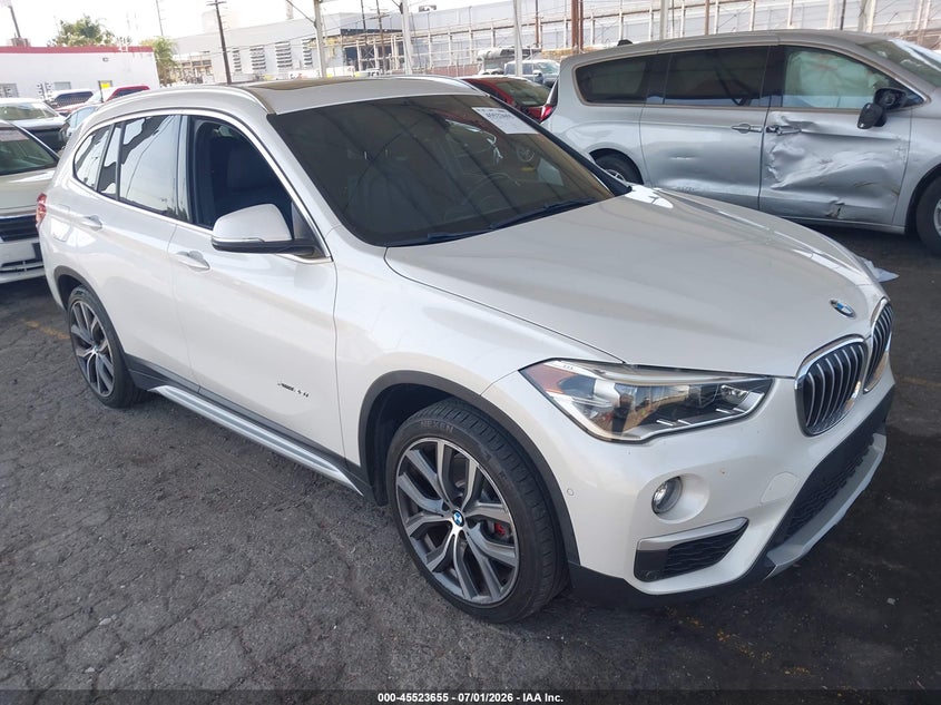 2016 BMW X1 VIN WBXHT3C39G5E47320 IAAI salvage auction — LEFT SIDE, Salvage (California), sold $2,050 on 2026-07-28 (photo 1)