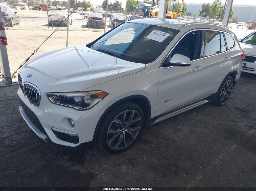 2016 BMW X1 VIN WBXHT3C39G5E47320 IAAI salvage auction — LEFT SIDE, Salvage (California), sold $2,050 on 2026-07-28 (photo 2)