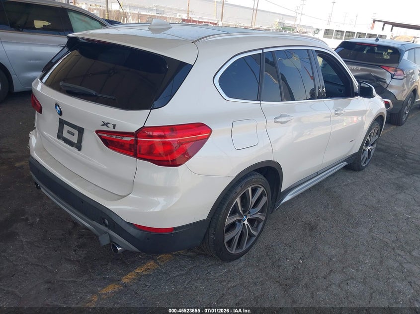 2016 BMW X1 VIN WBXHT3C39G5E47320 IAAI salvage auction — LEFT SIDE, Salvage (California), sold $2,050 on 2026-07-28 (photo 4)