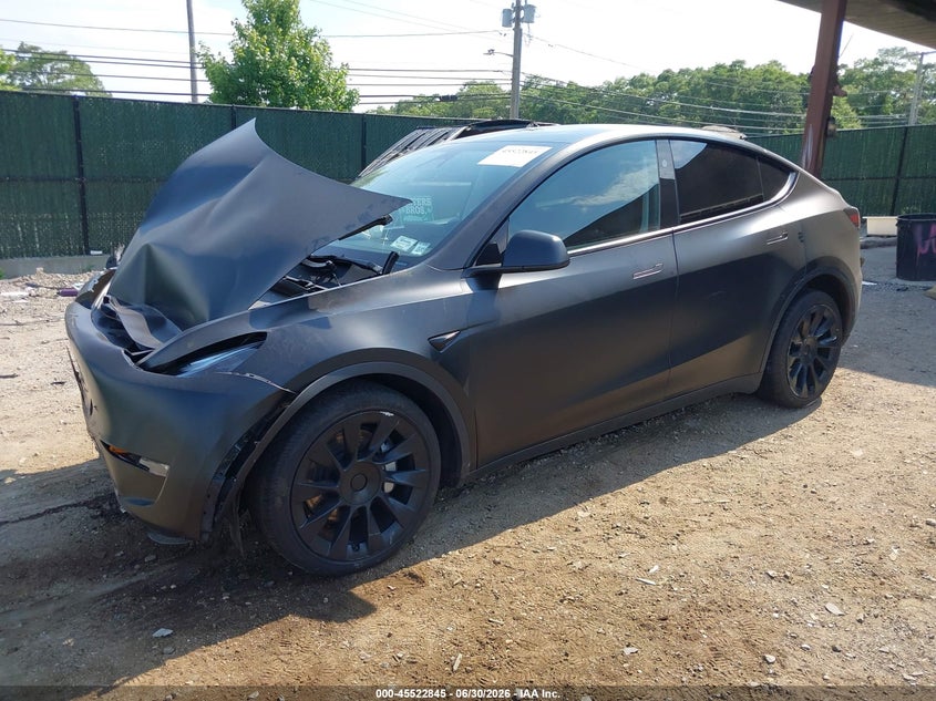 2023 Tesla Model y VIN 7SAYGDEE4PA172912 IAAI salvage auction — FRONT END, Salvage Title, sold $8,100 on 2026-07-31 (photo 6)