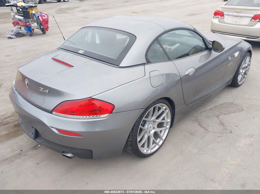 2013 BMW Z4 VIN WBALM7C52DE385648 IAAI salvage auction — REAR END, Salvage (California), sold $7,300 on 2026-07-16 (photo 4)