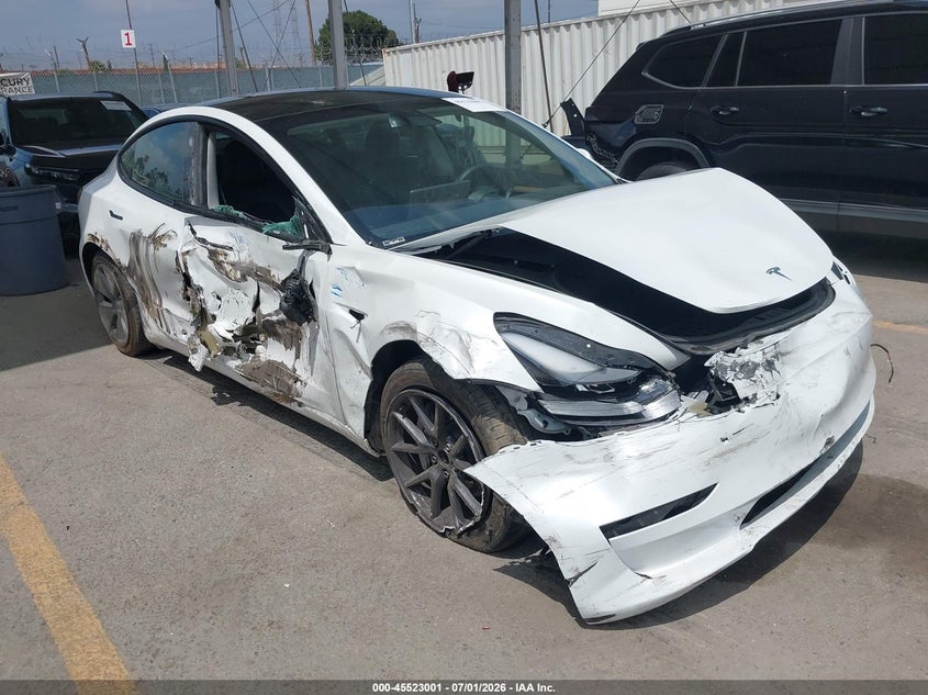 2023 Tesla Model 3 VIN 5YJ3E1EA1PF615271 IAAI salvage auction — FRONT END, Salvage Title, sold $5,700 on 2026-07-29 (photo 1)