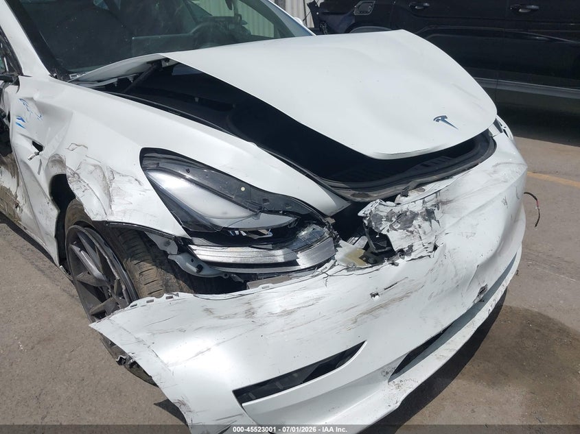 2023 Tesla Model 3 VIN 5YJ3E1EA1PF615271 IAAI salvage auction — FRONT END, Salvage Title, sold $5,700 on 2026-07-29 (photo 6)
