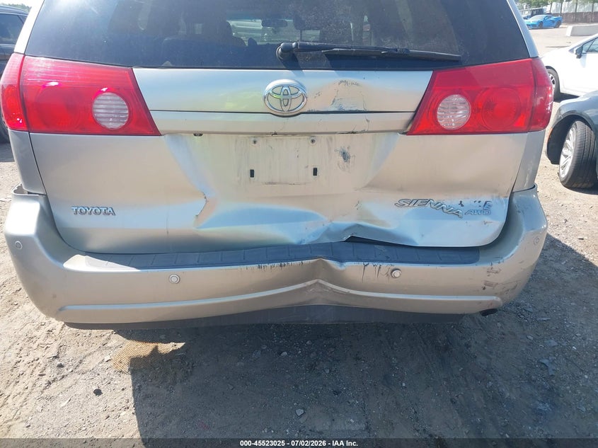 2009 Toyota Sienna VIN 5TDBK22C39S027743 IAAI salvage auction — NORMAL WEAR, Clear (Michigan), sold $875 on 2026-07-09 (photo 6)