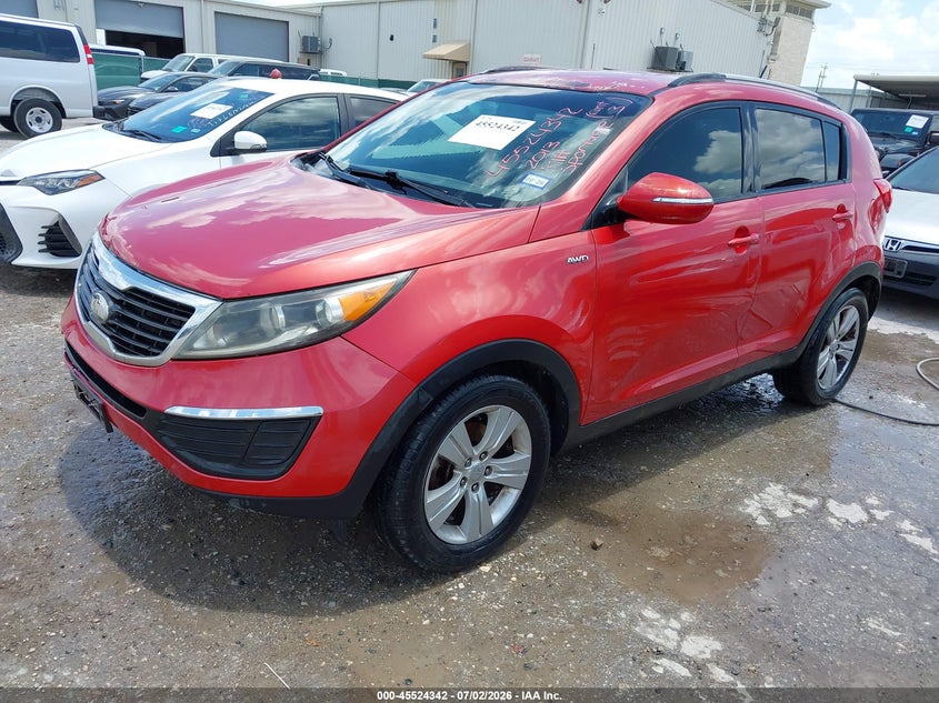 2013 Kia Sportage VIN KNDPBCA22D7412184 IAAI salvage auction — NORMAL WEAR, Original (Texas), sold $525 on 2026-07-29 (photo 2)