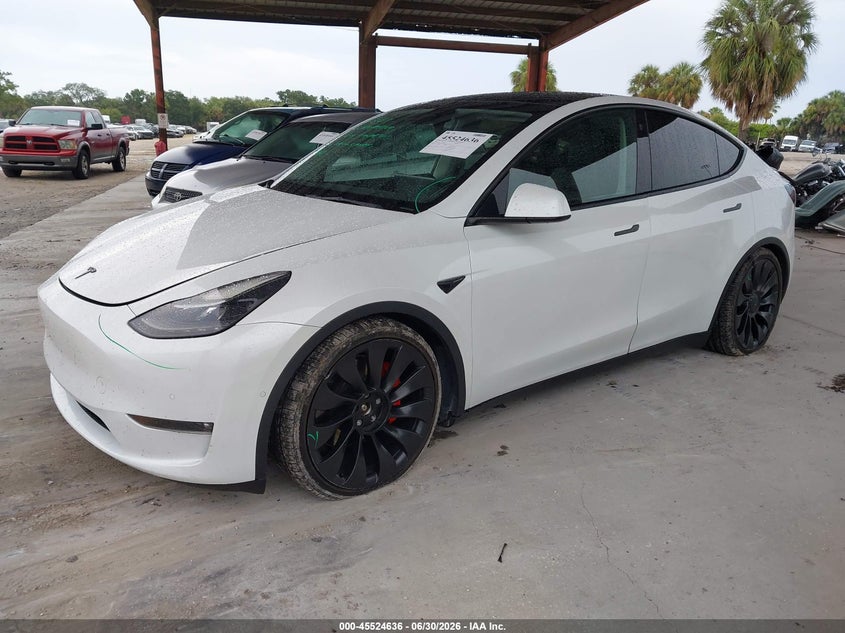 2022 Tesla Model y VIN 7SAYGDEF1NF517533 IAAI salvage auction — UNDERCARRIAGE, Certificate Of Destruction (Florida), sold $13,100 on 2026-07-30 (photo 2)
