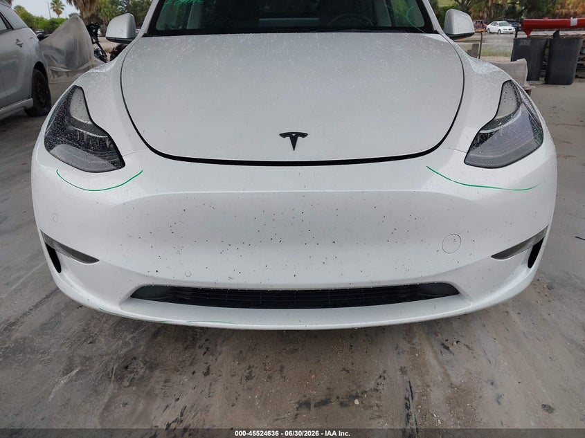 2022 Tesla Model y VIN 7SAYGDEF1NF517533 IAAI salvage auction — UNDERCARRIAGE, Certificate Of Destruction (Florida), sold $13,100 on 2026-07-30 (photo 6)