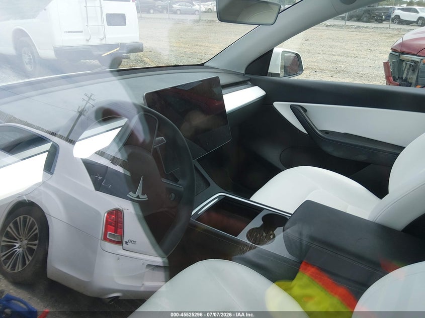 2022 Tesla Model y VIN 7SAYGAEE7NF382564 IAAI salvage auction — UNKNOWN, Salvage (Virginia), sold $10,000 on 2026-07-22 (photo 7)