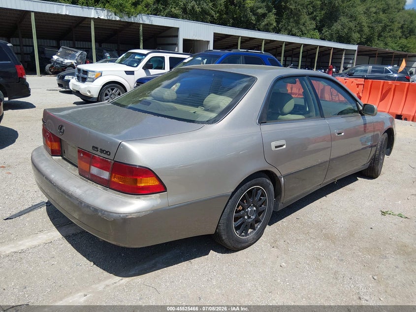 1999 Lexus Es 300 VIN JT8BF28G0X5068394 IAAI salvage auction — NORMAL WEAR, Clear (Kansas), sold $450 on 2026-07-15 (photo 4)