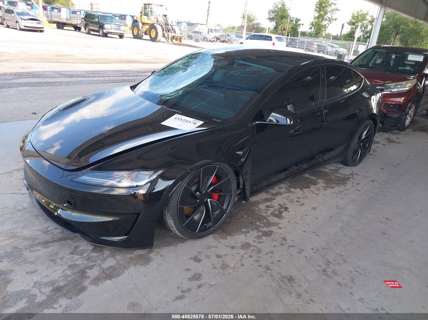 2026 Tesla Model 3 VIN 5YJ3E1ETXTF127724 IAAI salvage auction — FRONT END, Rebuildable (Florida), sold $18,300 on 2026-07-12 (photo 2)