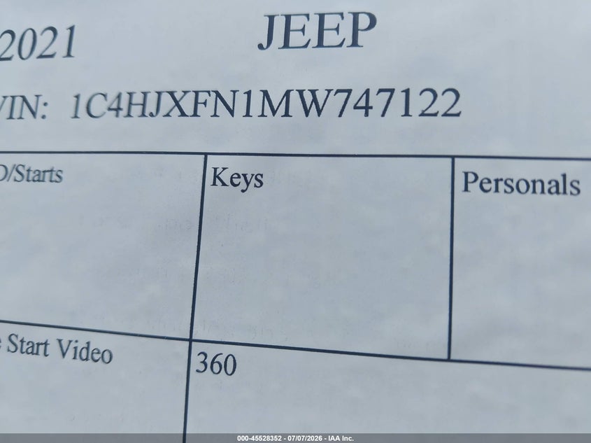 2021 Jeep Wrangler / VIN 1C4HJXFN1MW747122 IAAI salvage auction — UNKNOWN, Original (Texas), sold $14,400 on 2026-07-24 (photo 9)