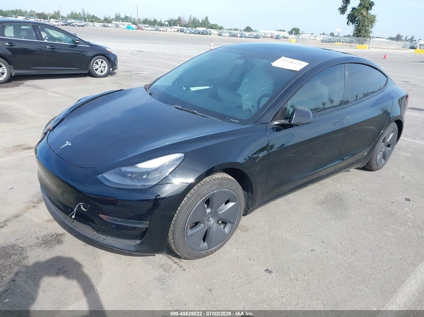 2022 Tesla Model 3 VIN 5YJ3E1EA1NF360182 IAAI salvage auction — SIDE, Salvage (California), sold $5,900 on 2026-07-10 (photo 2)