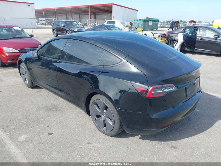 2022 Tesla Model 3 VIN 5YJ3E1EA1NF360182 IAAI salvage auction — SIDE, Salvage (California), sold $5,900 on 2026-07-10 (photo 3)