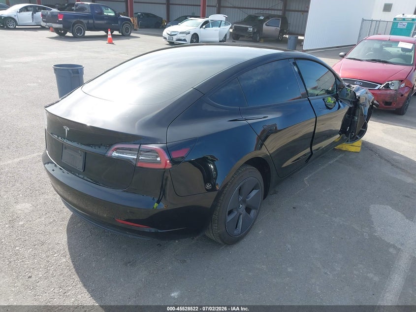 2022 Tesla Model 3 VIN 5YJ3E1EA1NF360182 IAAI salvage auction — SIDE, Salvage (California), sold $5,900 on 2026-07-10 (photo 4)