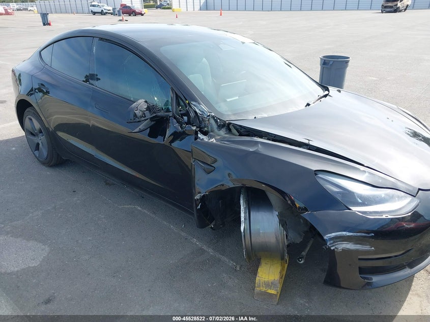 2022 Tesla Model 3 VIN 5YJ3E1EA1NF360182 IAAI salvage auction — SIDE, Salvage (California), sold $5,900 on 2026-07-10 (photo 6)