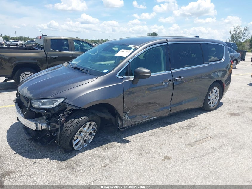2023 Chrysler Pacifica VIN 2C4RC1BG2PR553442 IAAI salvage auction — SIDE, Salvage Title, sold $9,950 on 2026-08-20 (photo 2)