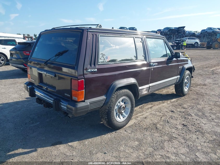 1989 Jeep Cherokee VIN 1J4FJ57LXKL596668 IAAI salvage auction — FRONT END, Rebuildable (Florida), sold $450 on 2026-07-23 (photo 4)