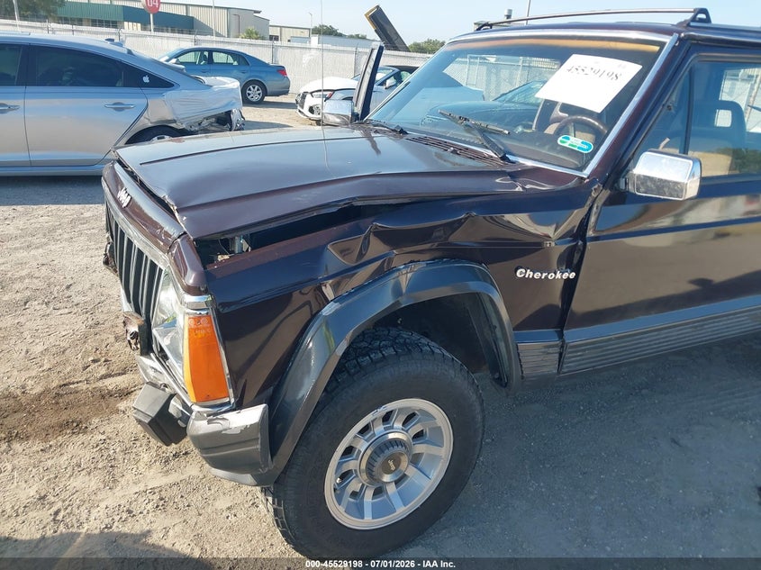 1989 Jeep Cherokee VIN 1J4FJ57LXKL596668 IAAI salvage auction — FRONT END, Rebuildable (Florida), sold $450 on 2026-07-23 (photo 6)