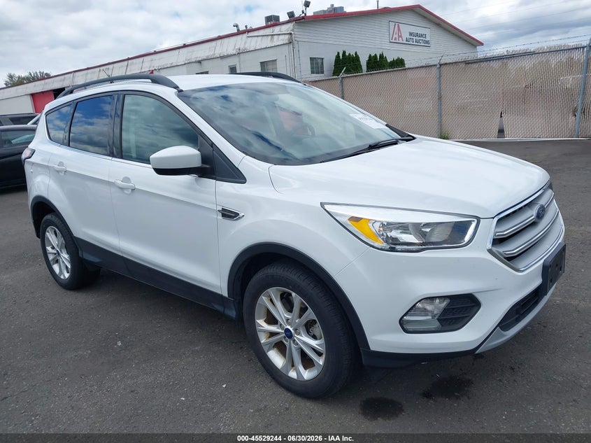 2018 Ford Escape VIN 1FMCU9GD5JUD08673 — IAAI salvage auction photo