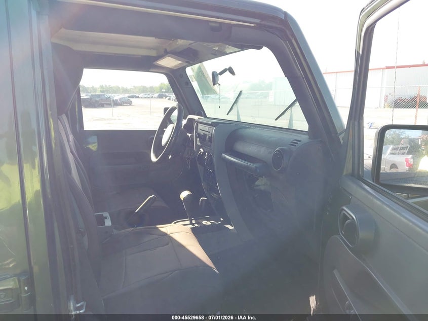 2007 Jeep Wrangler unlimited VIN 1J4GA59187L157962 IAAI salvage auction — NORMAL WEAR, Clear (Florida), sold $1,950 on 2026-08-03 (photo 5)