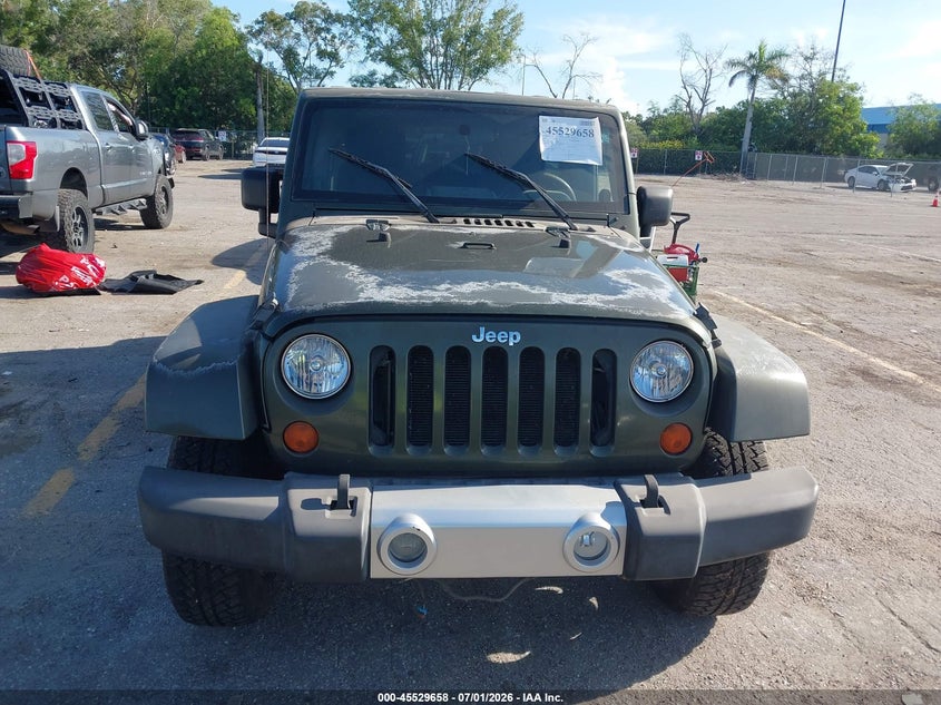 2007 Jeep Wrangler unlimited VIN 1J4GA59187L157962 IAAI salvage auction — NORMAL WEAR, Clear (Florida), sold $1,950 on 2026-08-03 (photo 6)