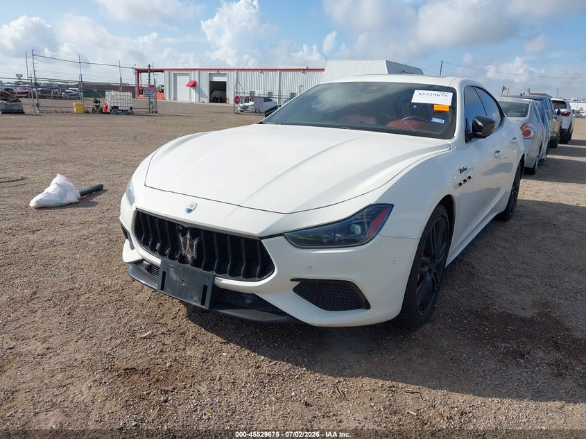 2023 Maserati Ghibli VIN ZAM57YSM0PX423691 IAAI salvage auction — WATER/FLOOD, Salvage (Texas), sold $8,200 on 2026-08-11 (photo 6)