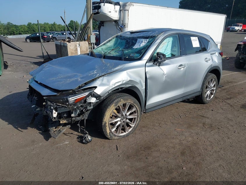 2021 Mazda Cx-5 VIN JM3KFBDM3M0355578 IAAI salvage auction — ROLLOVER, Salvage Title, sold $1,500 on 2026-07-26 (photo 2)