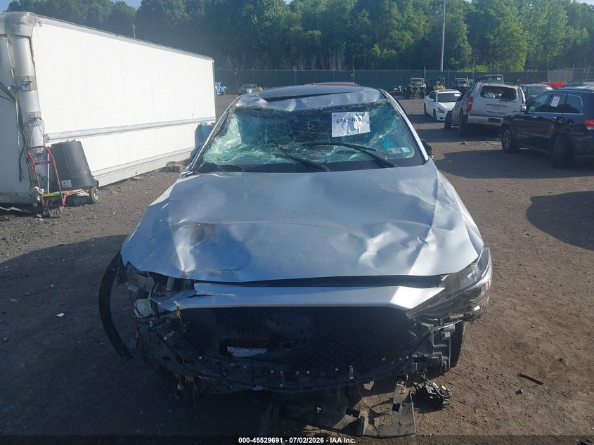 2021 Mazda Cx-5 VIN JM3KFBDM3M0355578 IAAI salvage auction — ROLLOVER, Salvage Title, sold $1,500 on 2026-07-26 (photo 6)