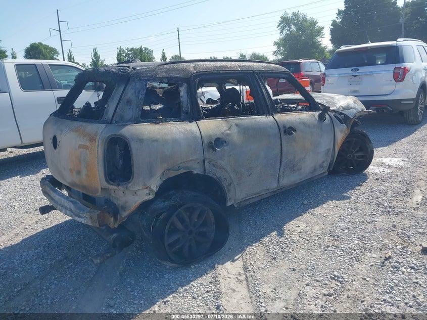 2014 Mini Countryman VIN WMWZC5C54EWM16959 IAAI salvage auction — INTERIOR BURN, Junk (Missouri), sold $75 on 2026-08-17 (photo 4)