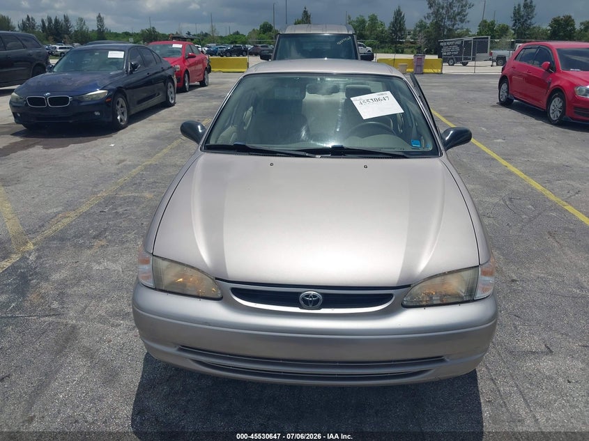 1999 Toyota Corolla VIN 1NXBR12E5XZ143229 IAAI salvage auction — NORMAL WEAR, Clear (Florida), sold $1,050 on 2026-07-09 (photo 6)