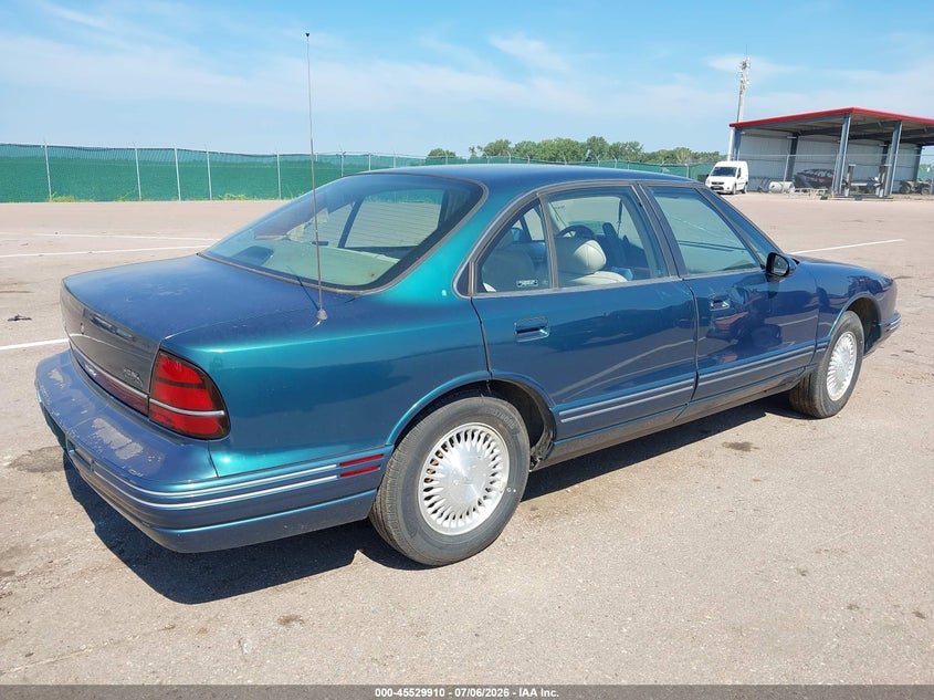 1998 Oldsmobile Regency VIN 1G3HC52K4W4816121 IAAI salvage auction — NORMAL WEAR, Regular Certificate (Iowa), sold $400 on 2026-07-28 (photo 4)