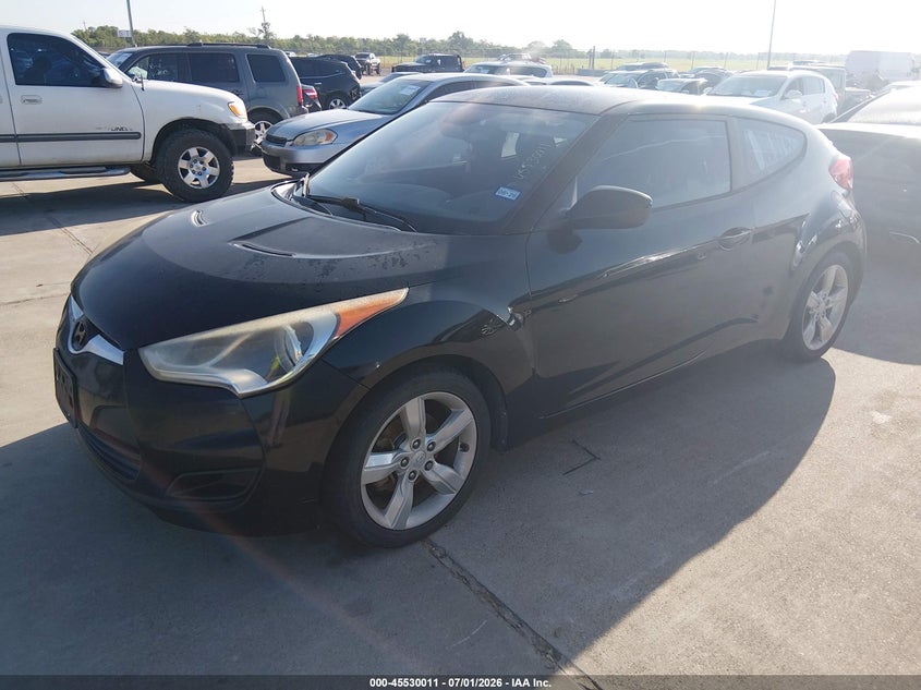 2013 Hyundai Veloster VIN KMHTC6AD6DU145059 IAAI salvage auction — NORMAL WEAR, Original (Texas), sold $25 on 2026-07-10 (photo 2)