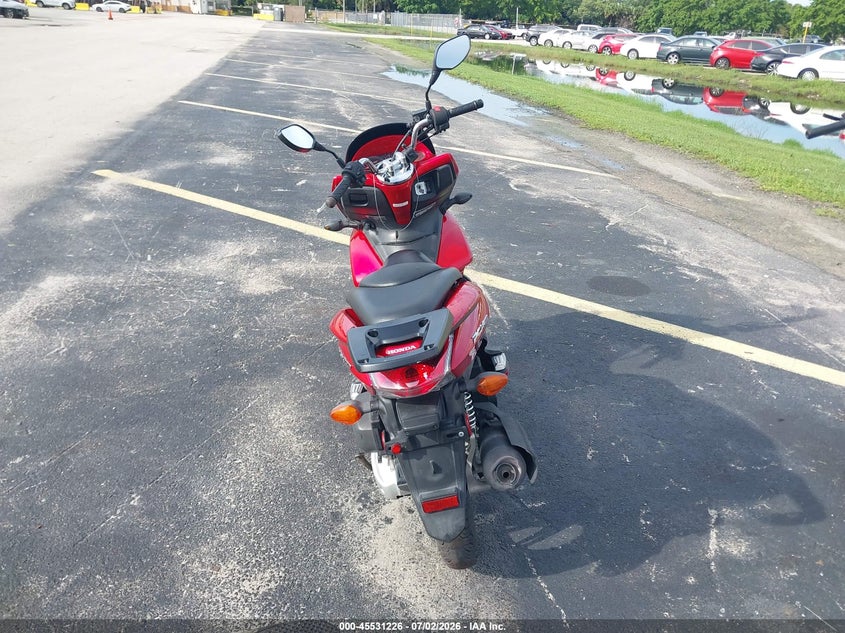 2013 Honda Pcx VIN MLHKF1216D5001873 IAAI salvage auction — SIDE, Rebuildable (Florida), sold $75 on 2026-07-28 (photo 6)