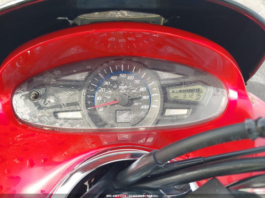 2013 Honda Pcx VIN MLHKF1216D5001873 IAAI salvage auction — SIDE, Rebuildable (Florida), sold $75 on 2026-07-28 (photo 7)
