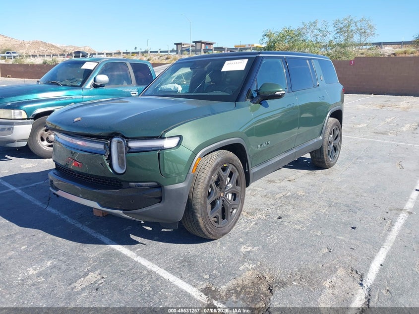 2025 Rivian R1s VIN 7PDSGBBAXSN069279 IAAI salvage auction — RIGHT FRONT, Salvage Title, sold $12,500 on 2026-09-08 (photo 2)