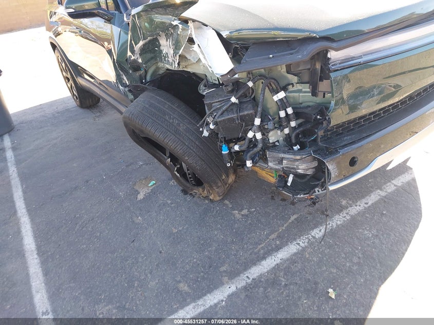 2025 Rivian R1s VIN 7PDSGBBAXSN069279 IAAI salvage auction — RIGHT FRONT, Salvage Title, sold $12,500 on 2026-09-08 (photo 6)