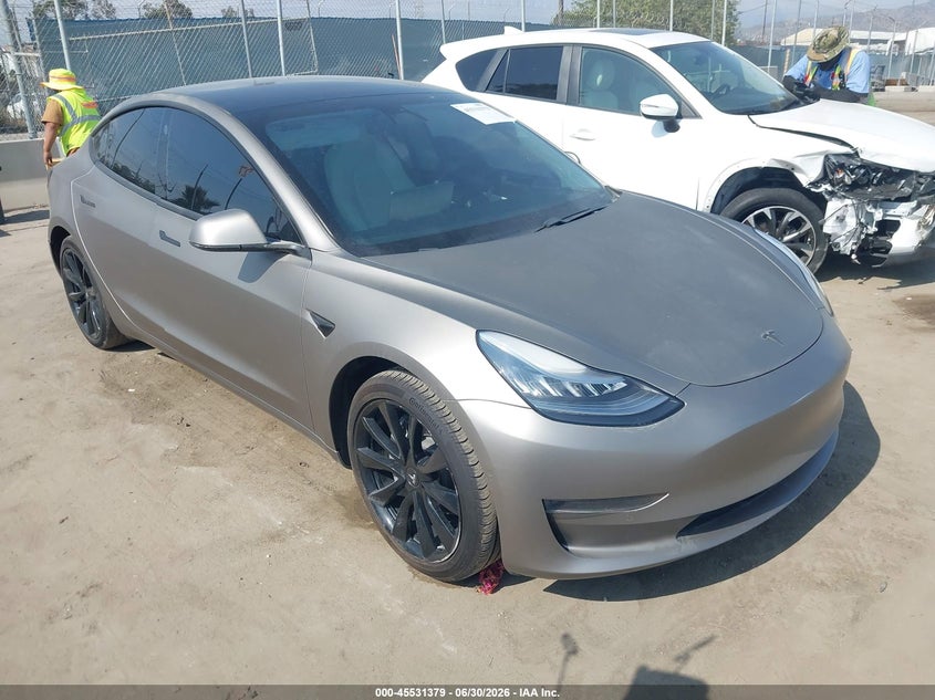 2020 Tesla Model 3 VIN 5YJ3E1EA9LF615643 IAAI salvage auction — LEFT REAR, Salvage (California), sold $8,550 on 2026-07-29 (photo 1)