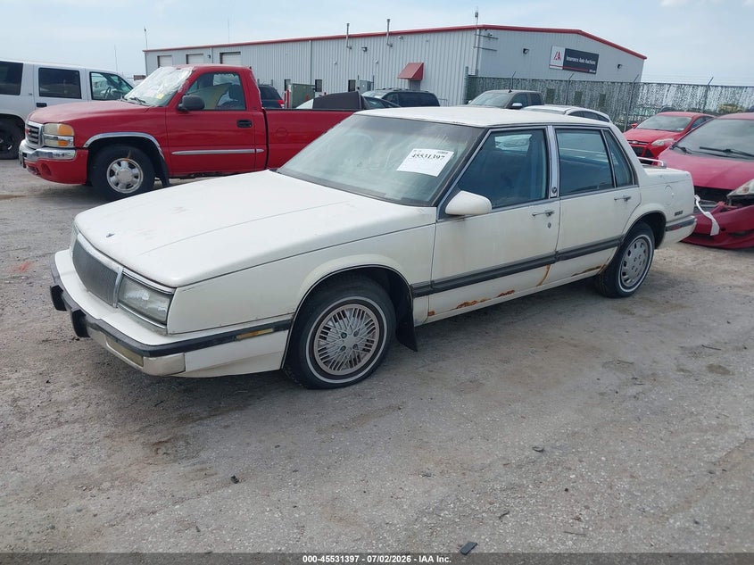 1990 Buick Lesabre VIN 1G4HR54C1LH557656 IAAI salvage auction — NORMAL WEAR, Clear (Kansas), sold $200 on 2026-07-31 (photo 2)