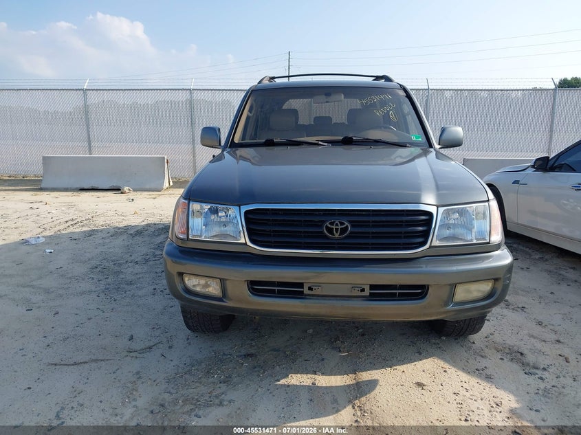 1999 Toyota Land cruiser VIN JT3HT05J0X0055574 IAAI salvage auction — NORMAL WEAR, Clear (Virginia), sold $3,400 on 2026-07-08 (photo 6)